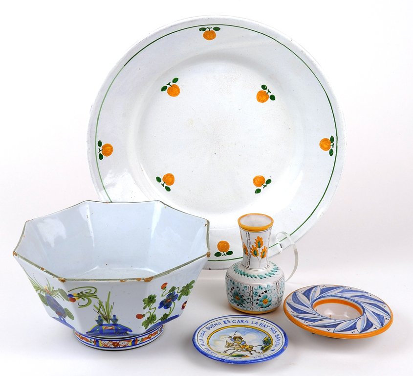 AN ASSEMBLED COLLECTION OF FAIENCE ARTICLES 5 pieces: AN ASSEMBLED COLLECTION OF FAIENCE ARTICLES Comprising a white ground charger with oranges motif, a Japonesque bowl in an Imari style pattern, a bud vase in teal and yellow on white ground, and two di