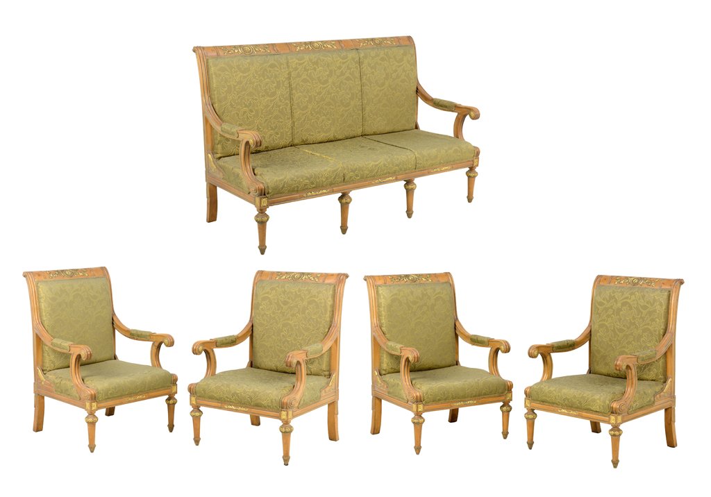 A FRENCH EMPIRE STYLE UPHOLSTERED SALON SUITE: A FRENCH EMPIRE STYLE UPHOLSTERED SALON SUITE The salon suite comprising four fauteuils and a settee. Each having an everted crest rail with gilt painted decoration over the upholstered back and seat,