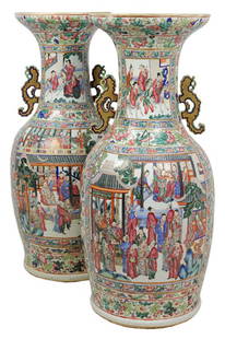 A NEAR PAIR OF PALACE SIZE CHINESE ROSE MANDARIN: A NEAR PAIR OF PALACE SIZE CHINESE ROSE MANDARIN PORCELAIN VASES Each having floral borders centering upper and lower court scenes between scrolling floral and foliate borders and having gilded and en