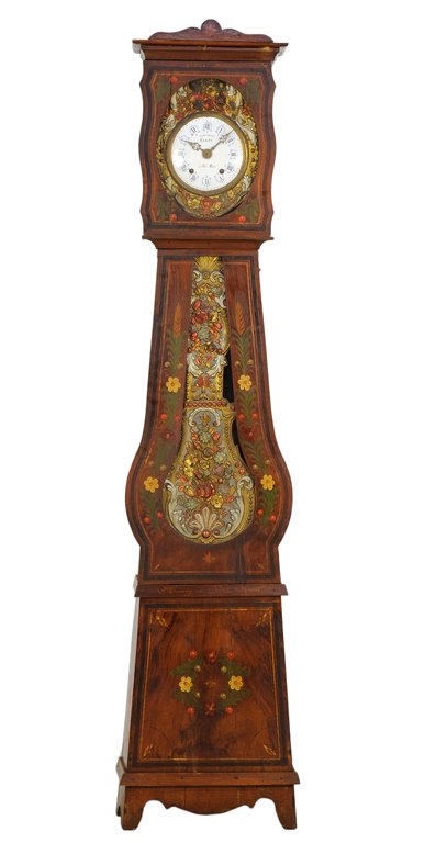 A FRENCH MORBIER STYLE PAINTED TALL CASE CLOCK: A FRENCH MORBIER STYLE PAINTED TALL CASE CLOCK Having a shaped pediment and flared cornice over the circular enameled dial with Roman numeral hours, within a painted and pressed gilt metal border, the
