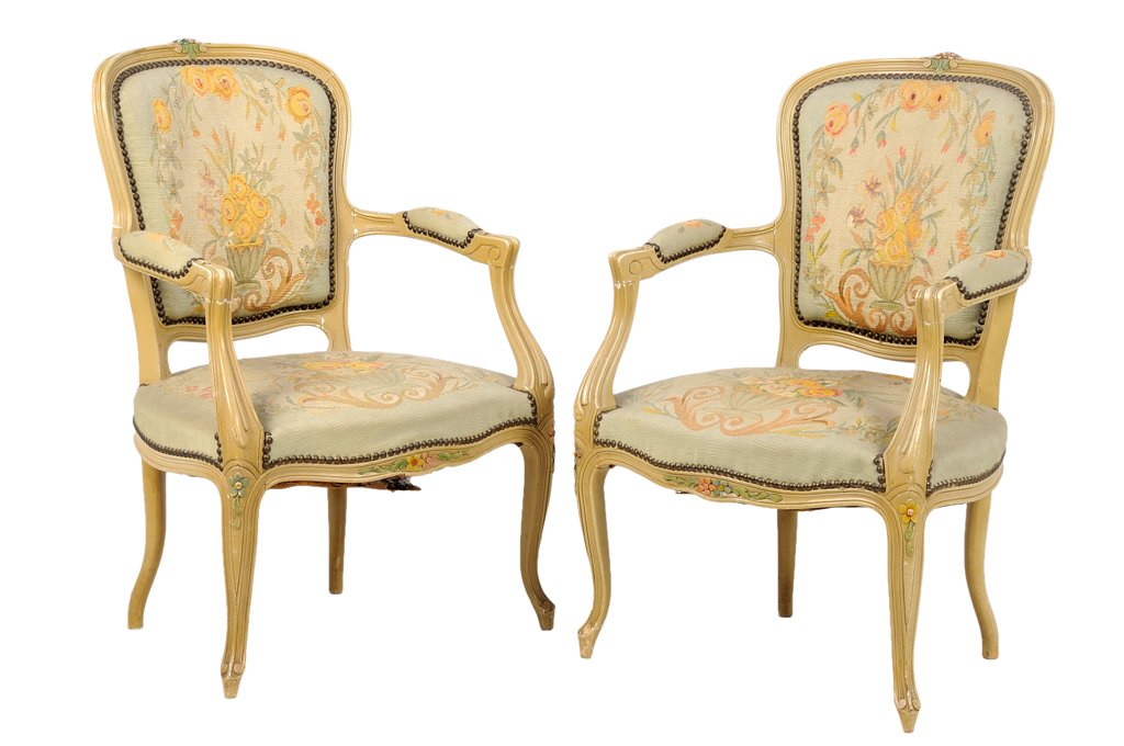 A PAIR OF FRENCH LOUIS XV STYLE PAINTED FAUTEUILS: A PAIR OF FRENCH LOUIS XV STYLE PAINTED FAUTEUILS Each fauteuil with a curved crest rail centered with a carved rosette, above the cartouche form embroidered back splat and seat, within open arms, nai