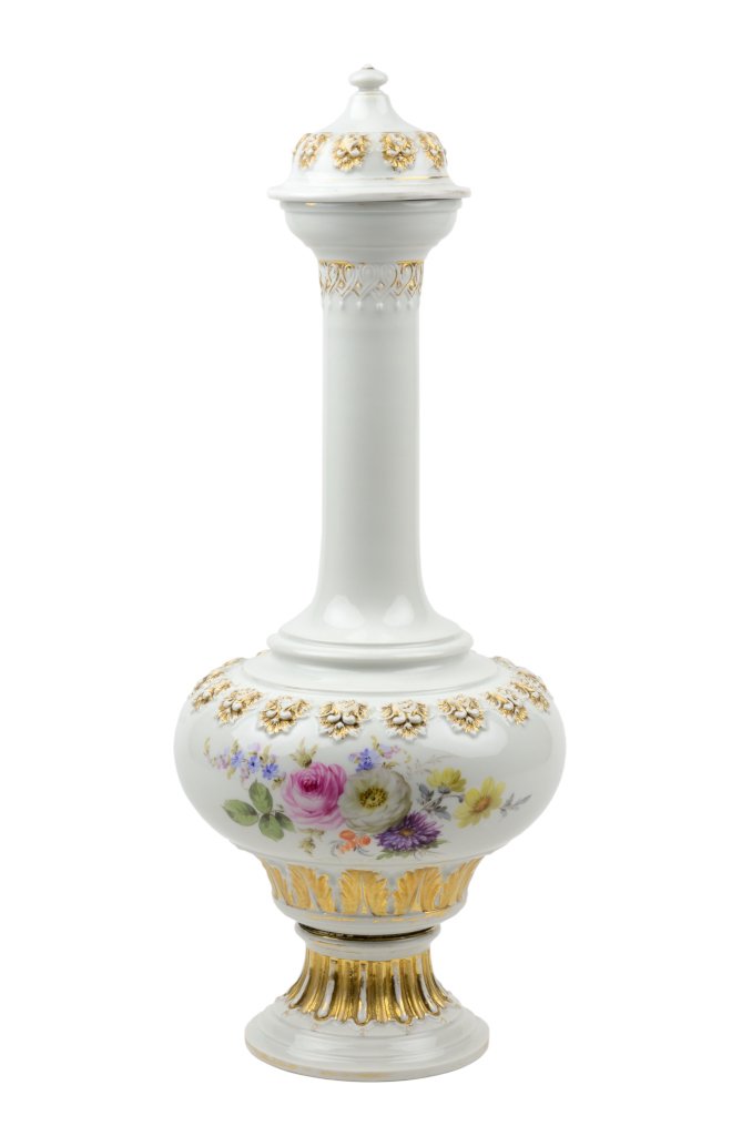 A MEISSEN PORCELAIN COVERED BOTTLE VASE: A MEISSEN PORCELAIN COVERED BOTTLE VASE Late 19th century Of slender baluster form, having gilt painted floral accents in relief throughout, the body centering painted floral sprays above gilt painted