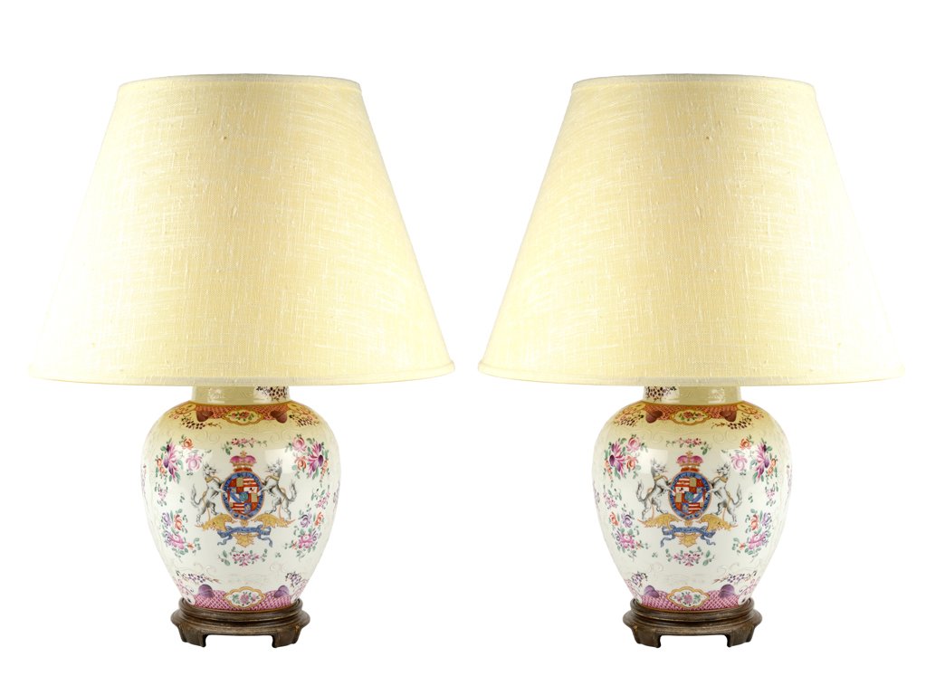A PAIR OF CHINESE EXPORT STYLE PORCELAIN JARS: A PAIR OF CHINESE EXPORT STYLE PORCELAIN JARS Likely French, Edme Samson & Cie., in the Chinese Export style, each centering armorial motifs between the surrounding painted floral sprays and having pi