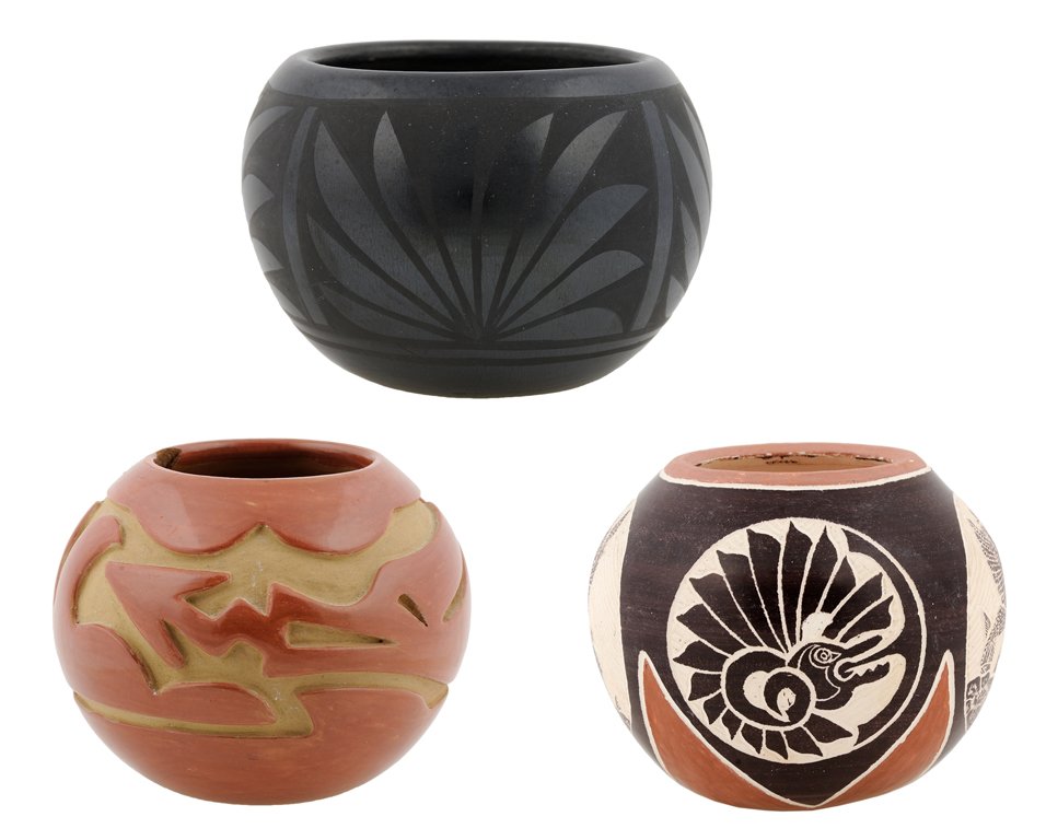 THREE AMERICAN INDIAN POTTERY VESSELS: THREE AMERICAN INDIAN POTTERY VESSELS Comprising a Santa Clara pueblo carved redware pottery olla by Mary Cain and a San Ildefonso pueblo blackware pottery bowl by Albert and Josephine Vigil, each sig