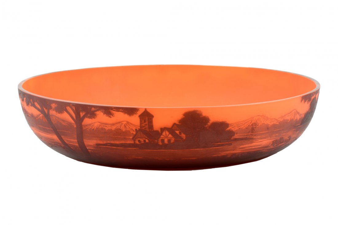 A RICHARD CAMEO GLASS CONSOLE BOWL: A RICHARD CAMEO GLASS CONSOLE BOWL Circa 1918-1925 Depicting a mountainous village scene in cameo over the orange ground, signed Richard in cameo at lower, likely produced by Loetz (Bohemia) for the F