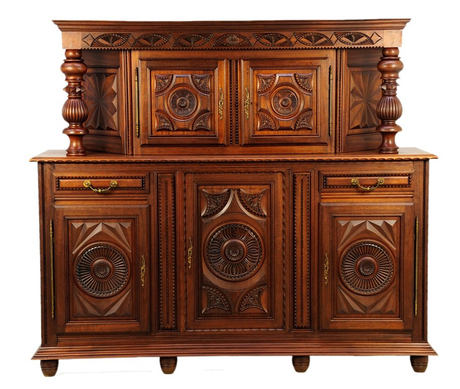 A RENAISSANCE REVIVAL COURT CUPBOARD: A RENAISSANCE REVIVAL COURT CUPBOARD Having a flared cornice over a geometric fan patterned frieze, raised on repeating baluster form supports, centering two upper paneled doors, over the rectangular 