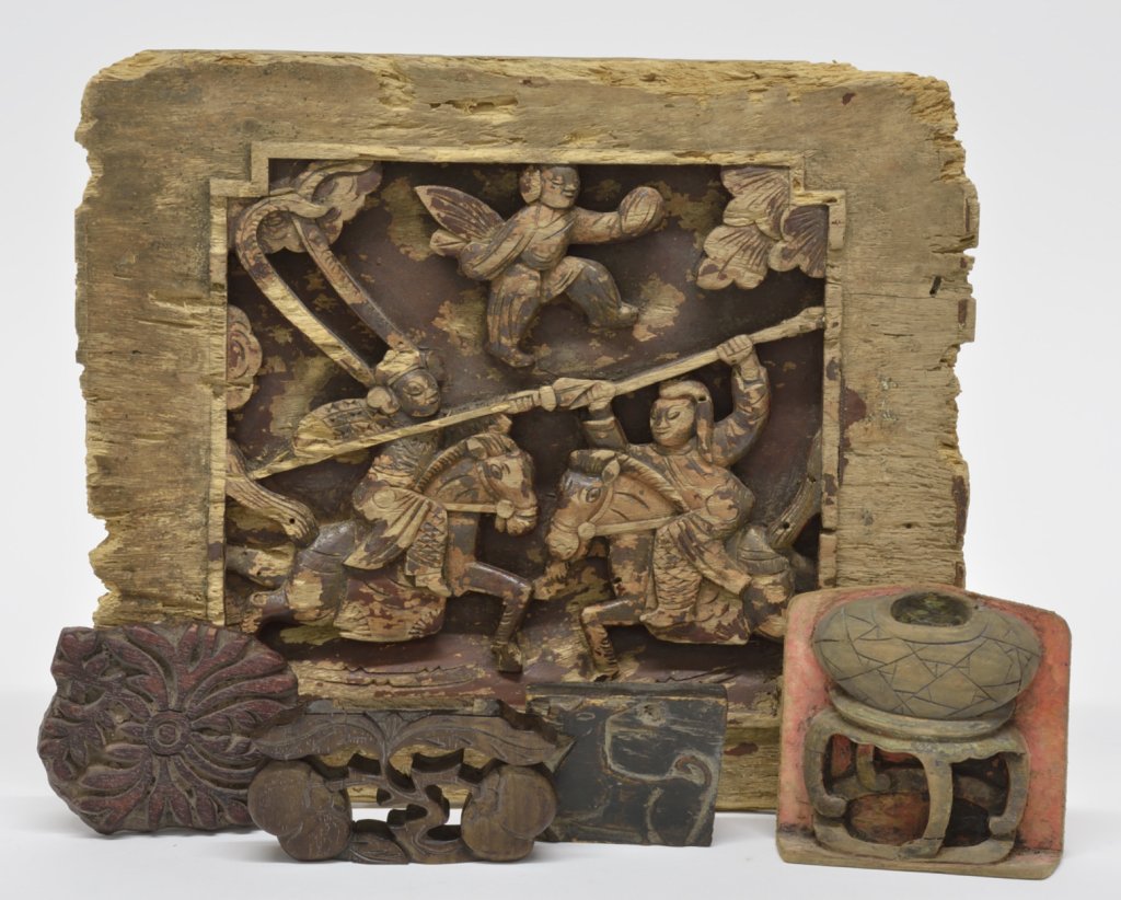 FIVE ASIAN WOODEN ARCHITECTURAL ELEMENTS: FIVE ASIAN WOODEN ARCHITECTURAL ELEMENTS Comprising a relief-carved wood panel depicting opposing warriors on horseback, together with four additional examples. H 10½ x W 12½ x D 1 inches. Provenanc