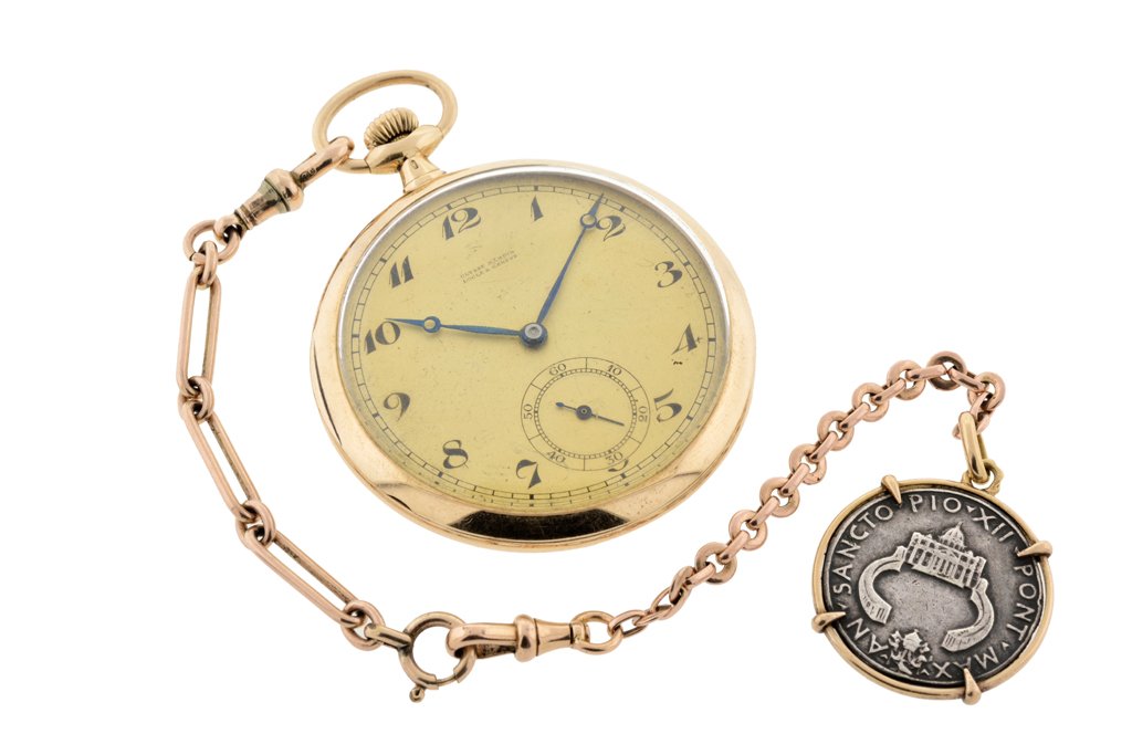 A ULYSSE NARDIN 14 KARAT GOLD POCKET WATCH Approximate: A ULYSSE NARDIN 14 KARAT GOLD POCKET WATCH Circa 1920's Having a gold enameled dial with Arabic hours and blued steel pierced lancet hands, outer minute track, subsidiary second dial at lower center,