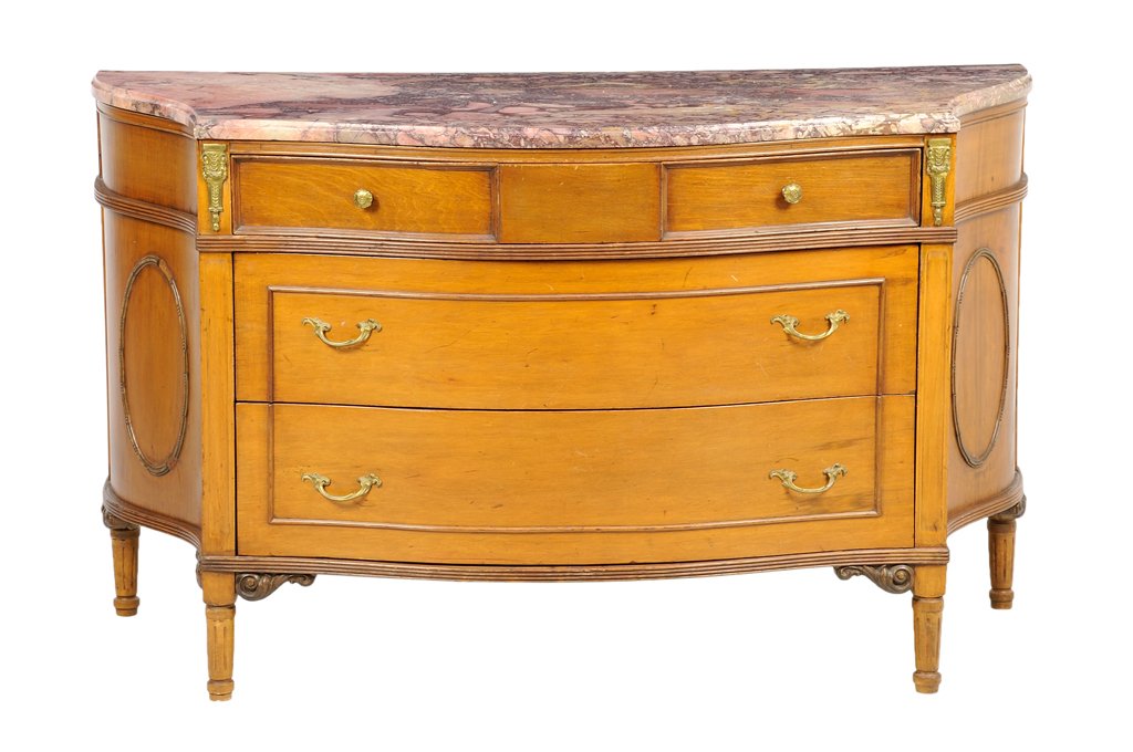 A FRENCH LOUIS XVI STYLE COMMODE: A FRENCH LOUIS XVI STYLE COMMODE 19th Century The commode having a shaped demilune marble top over the conforming case, fitted with two shorts drawers, over the long drawers, gilt metal mounts, raised