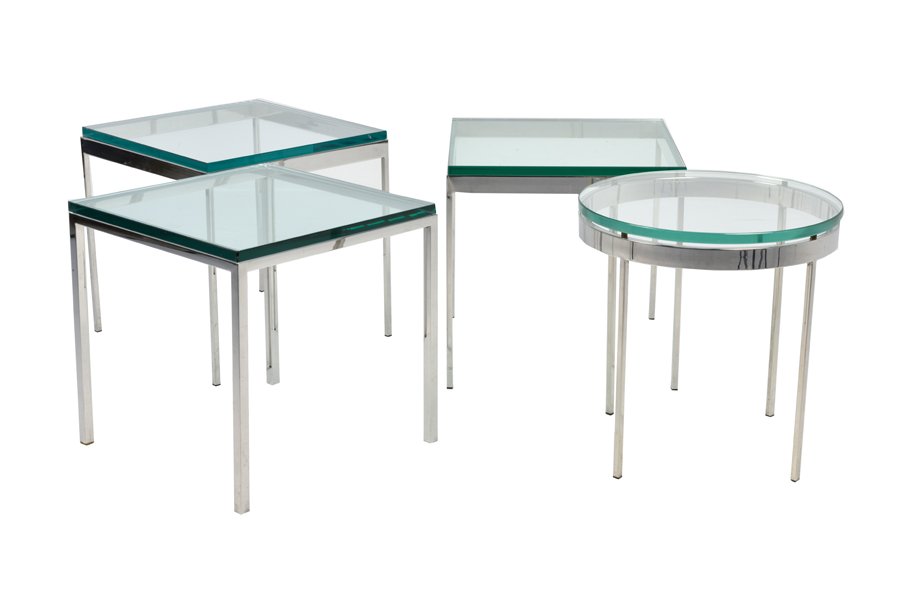FOUR FLORENCE KNOLL STYLE CHROMED AND GLASS TABLES: FOUR FLORENCE KNOLL STYLE CHROMED AND GLASS TABLES Comprising three of square form and one circular. Each raised on chromed legs. Unmarked. H 18½ x W 18 x D 18 inches.