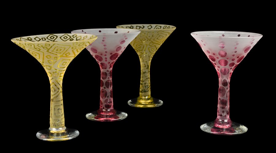 FOUR CZECH ART GLASS MARTINI GLASSES: FOUR CZECH ART GLASS MARTINI GLASSES Each having etched and frosted geometric motifs throughout. H 6¾ x diam 5¼ inches.