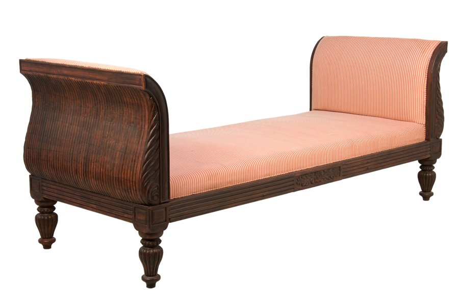 AN ENGLISH STYLE UPHOLSTERED DAYBED