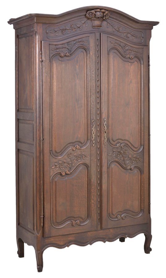 A FRENCH LOUIS XV STYLE ARMOIRE: A FRENCH LOUIS XV STYLE ARMOIRE The armoire having a curved cornice centered with a urn and foliate crest over the conforming case fitted with two paneled doors, over the serpentine apron, raised on s