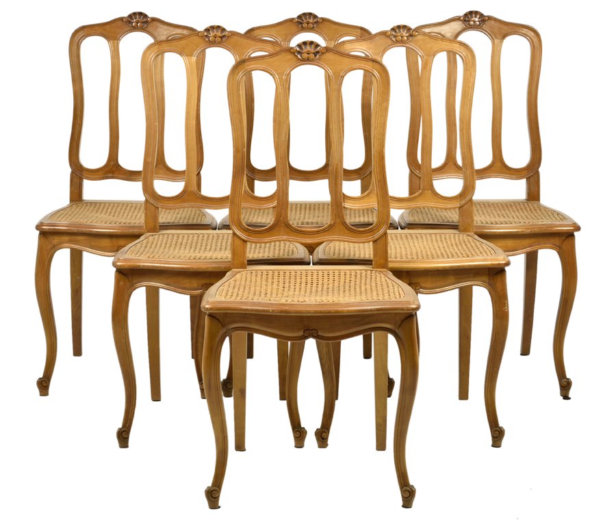 A SET OF SIX FRENCH LOUIS XV STYLE DINING CHAIRS: A SET OF SIX FRENCH LOUIS XV STYLE DINING CHAIRS Each dining chair having a shaped crest rail centered with a carved shell, over the vertical backsplats, above the caned seat, raised on cabriole legs,