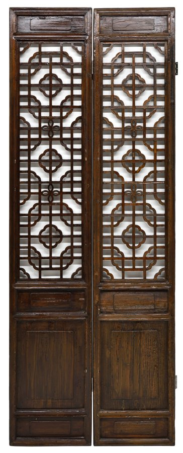 A CHINESE TWO-PANEL FLOOR SCREEN: A CHINESE TWO-PANEL FLOOR SCREEN Each panel of rectangular form, having geometric carved decoration. H 95½ x W 18¼ x D 2¼ inches.
