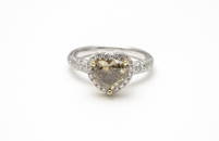 A HEART SHAPED FANCY COLOR DIAMOND RING