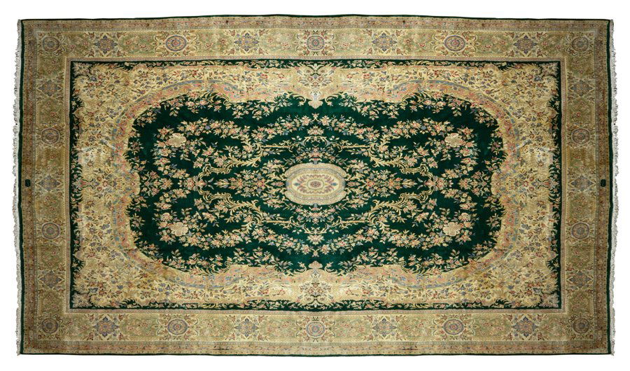 A KIRMAN WOOL RUG (1 of 4)