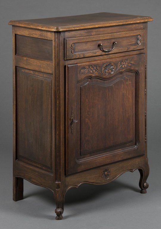 A FRENCH PROVINCIAL OAK CABINET (1 of 4)
