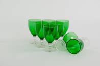 A SET OF EMERALD GLASS STEMWARE
