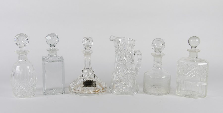 A GROUP OF FIVE DECANTERS AND STOPPERS (1 of 1)