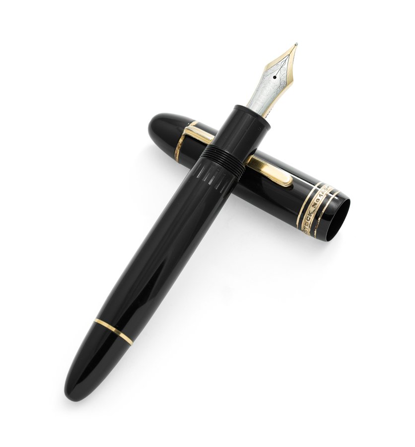 A MONTBLANC 149 FOUNTAIN PEN: A MONTBLANC 149 FOUNTAIN PEN The Meisterstück 149 fountain pen. Deep black resin with gold-coated details, surmounted by the white star emblem and finished with a handcrafted 14K gold nib. Pen is 5.7
