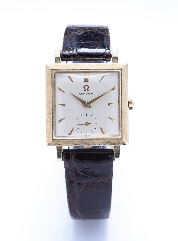 AN OMEGA SQUARE FACED 14 KARAT GOLD WATCH (1 of 1)