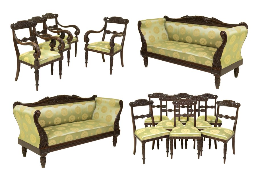 A CONTINENTAL CARVED 19TH CENTURY MAHOGANY SALON SUITE: A CONTINENTAL CARVED 19TH CENTURY MAHOGANY SALON SUITE Late 19th century, circa 1870 Comprising four armchairs, eight side chairs and two settees. Each having a coquille carved crest rail above the gr