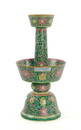 A CHINESE PORCELAIN 'BAJIXIANG' CANDLESTICK