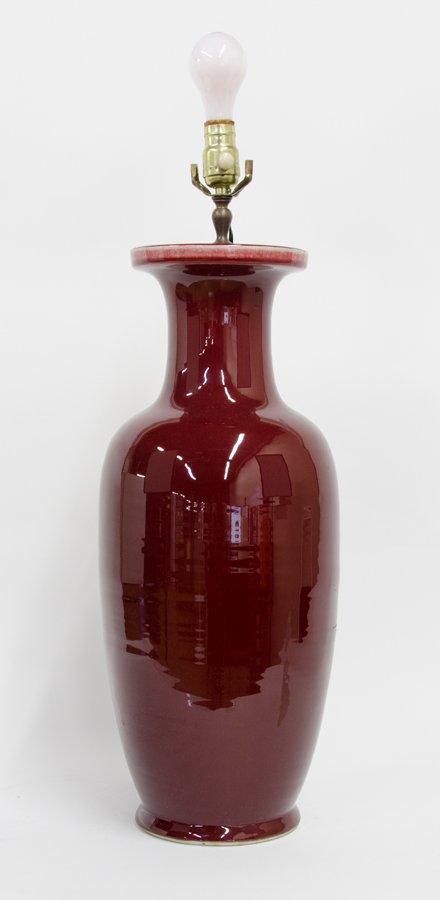 A OXBLOOD GLAZE VASE IN THE CHINESE STYLE MOUNTED AS A (1 of 1)