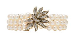 A THREE-STRAND CULTURED PEARL BRACELET WITH A 14K