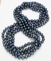 AN ENDLESS NECKLACE OF BLACK FRESHWATER PEARLS