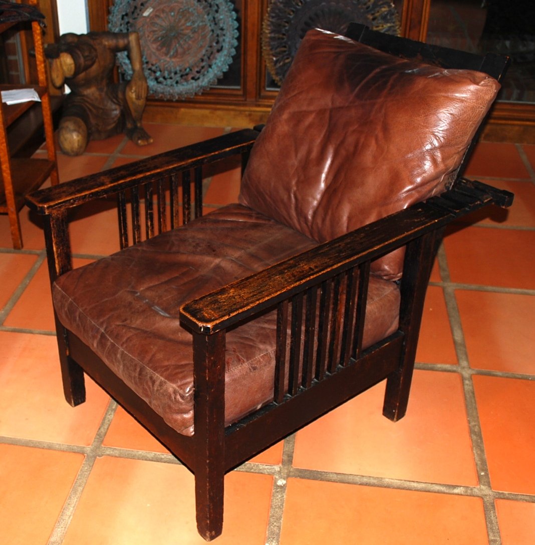 Morris Chair: Even arm, old worn, original finish, leather seat & cushions. 2 Spindles, 4 Adjustments