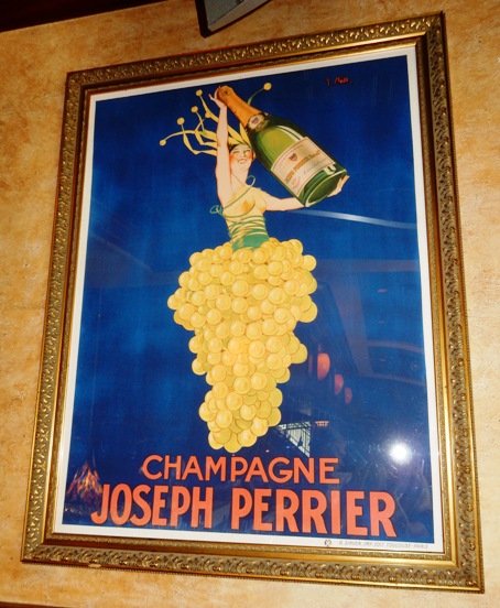 Framed French Poster: Champagne Joseph Perrier. 2 white spots left side. 49 3/4"x 63 3/8"Mounted under plexi