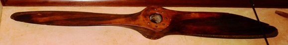 Wooden Propeller: Approx 90"x 10"x 8 7/8". Wear on the right blade but a really nice piece