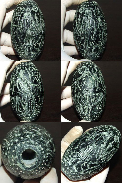 Wonderful Preown Afghan Black Intaglio Big Stone Bead: Wonderful Preowned Afghan Natural Intaglio Big Stone Bead , This bead is Carved Intaglio has a Hunter With many type of animals The size of it is 6 x 4 c m .