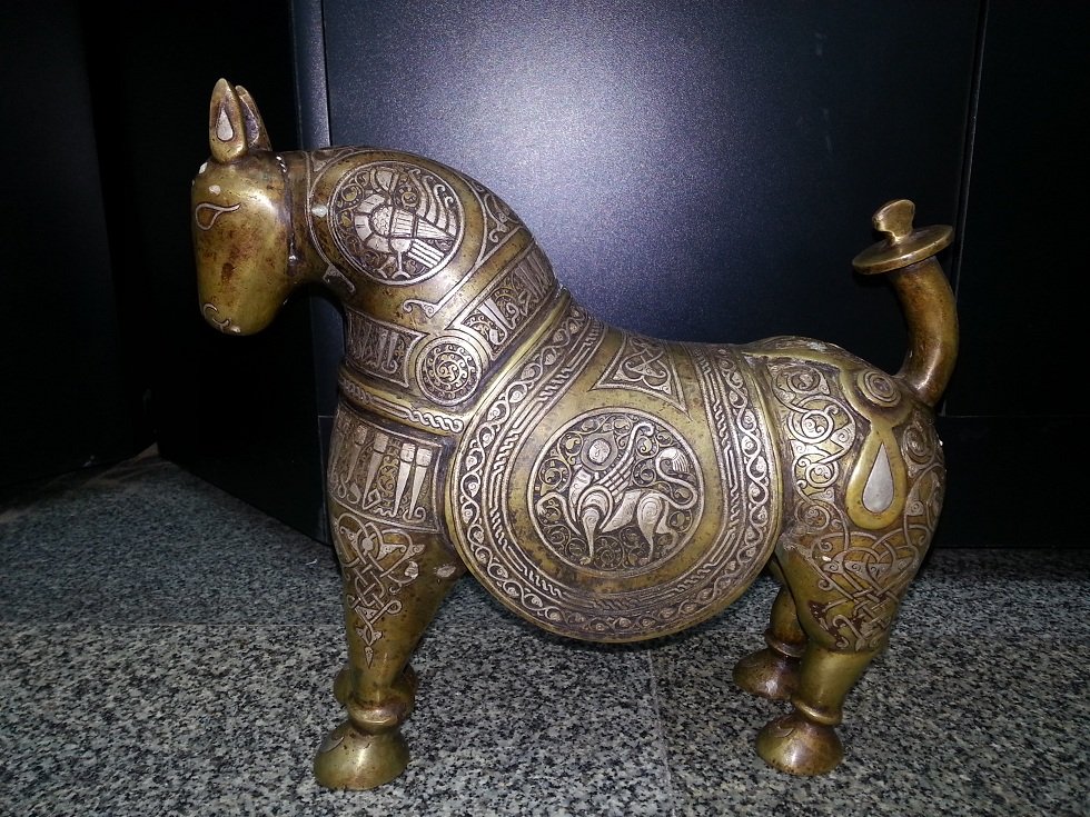Islamic Preowned Seljuk Silver Inlaid Bronze Horse # 61: A Really Stunning Undated Seljuk Islamic Bronze Horse decorated with silver inlaid openwork Birds & pegasus & Figures scenes alternating with text in calligraphic Kufic Islamic script , The Size is He