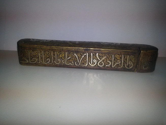 Islamic Style Silver inlaid brass Pen Box @16: Wonderful Islamic Style Silver inlaid Brass Pen box , All around have Islamic Calligraphic Wrting with Deers silver inlaid . Size is 6.5 x 1.5 " inches .
