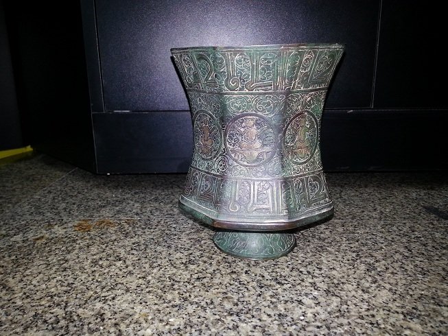 Used Preown Islamic Silver inlaid Copper Piece @31: Beautiful Unique Islamic seljuk Silver inlaid Copper Decoration Piece All around has silver inlaid Figural with Islamic Kufic Writings , The Size is 6 x 5.5 " inches .