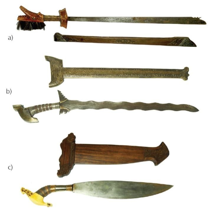 Moro Kris Set: a) An Okir Design Sword Mindanao metal, bone, wood, brass, and horse hair 45” x 5” x 1” (114 cm x 13 cm x 3 cm) b) A Kris Sword Moro, Sulu metal and brass 32” x 7” x 1 1/2” (81 cm x 18 cm 