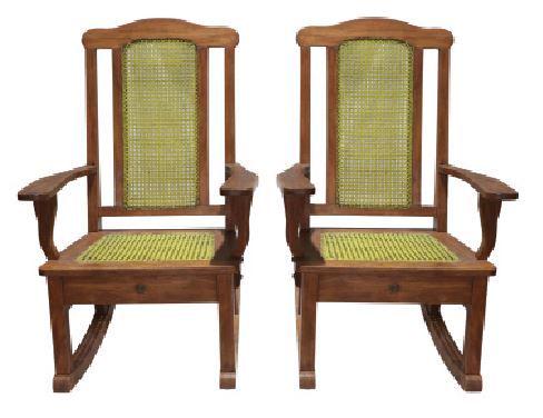 A Pair of Rocking Chairs Marked â€œManila P.I.â€: hardwood 40” x 26” x 34” (102 cm x 66 cm x 86 cm) each