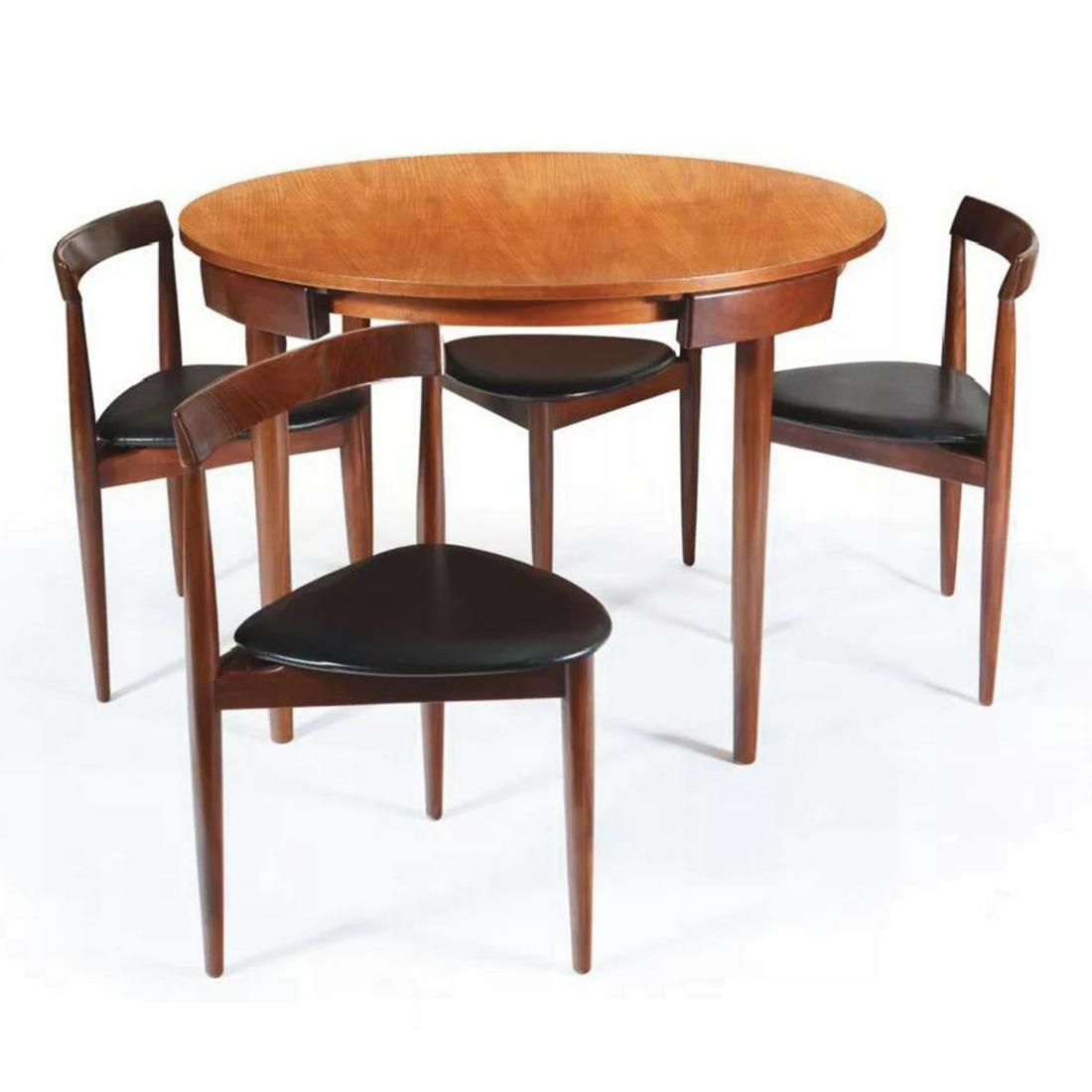 Hans Olsen for Frem RÃ¸jle: Hans Olsen for Frem Røjle Model 631 RoundetteDesign: 1950Condition: VintageSet of Four, Three-legged chairs made from Rosewood and black vinyl. Table measures 157 cm long when fully exten