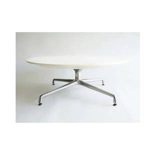 Coalesse Coffee Table Design : Scott Wilson for: Coalesse Coffee Table Design : Scott Wilson for Coalesse H 16” Diameter 42” " " Round Coffee or Occassional Table, cast aluminum polished base and white top. Heavy, solid p