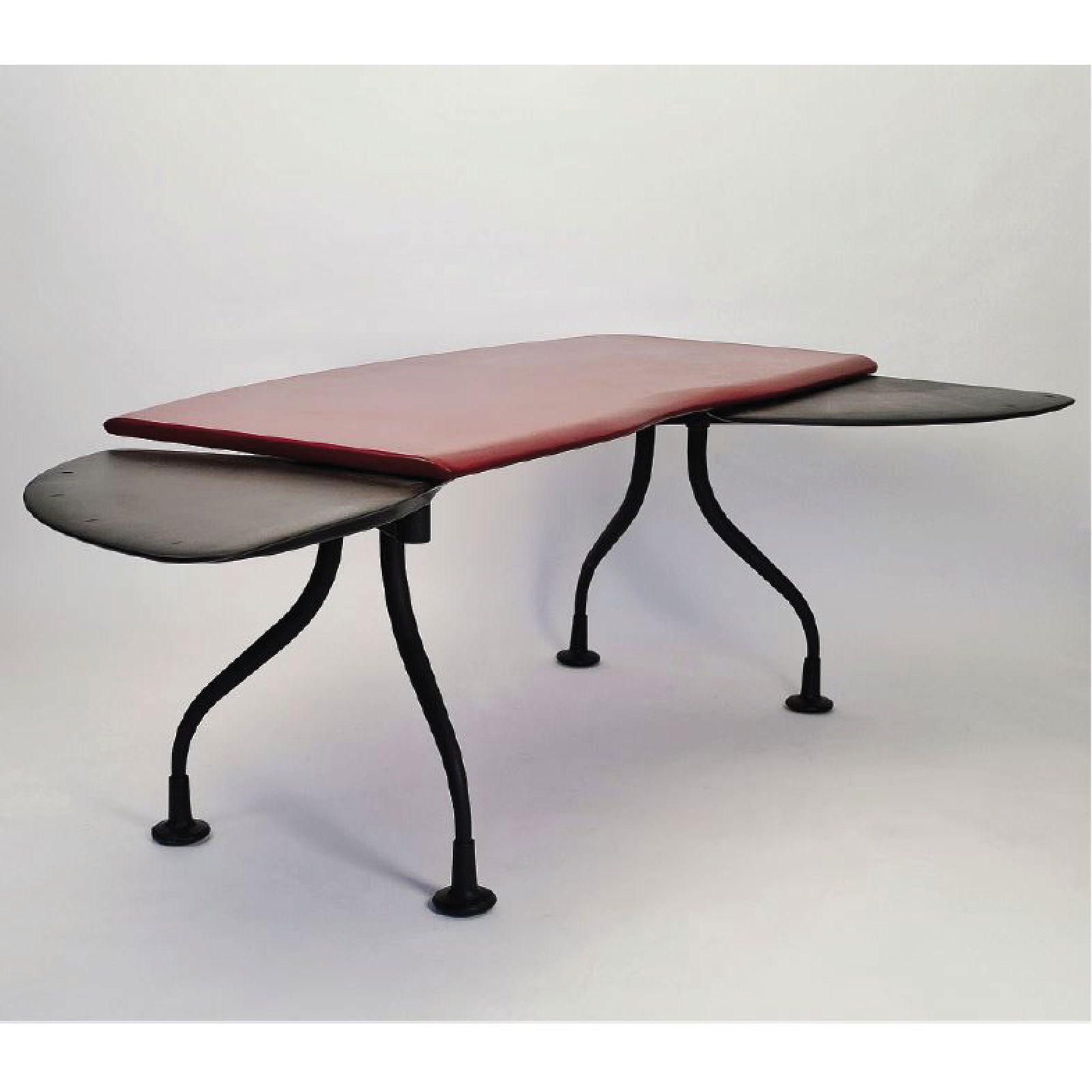 A Herman Miller Kiva Wing Table Designed By Eric Chan,