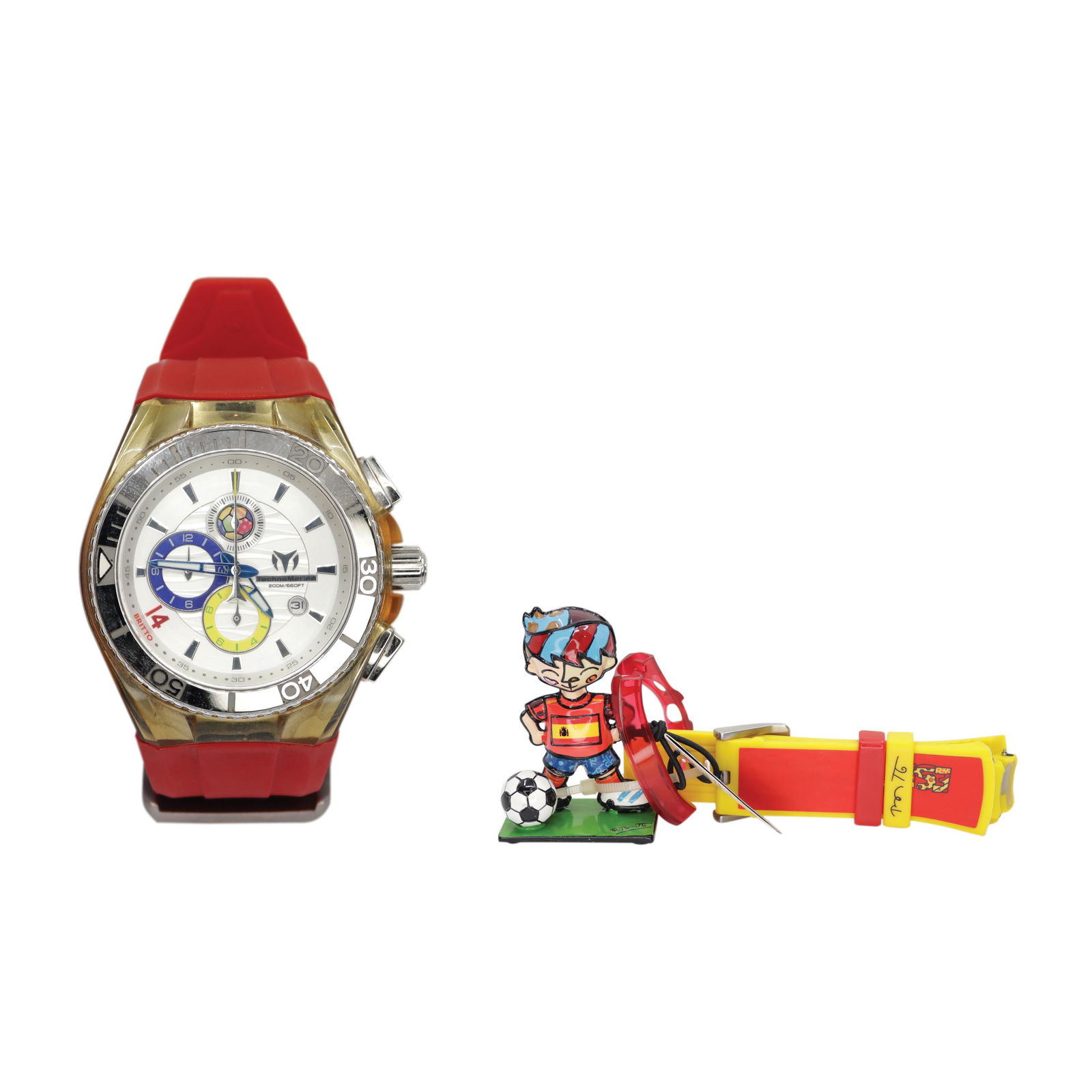 Technomarine: Cruise Tribute Spain Edition By Britto(Tribute to Soccer) Unisex Watch 114023DDial: SilverCase: Stainless SteelSize: 45 mmMovement: QuartzAccessories: Extra strap and figurine