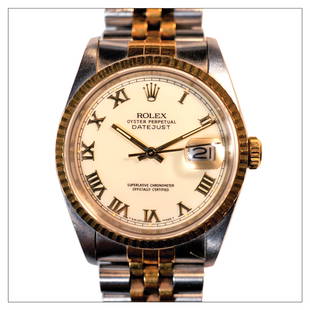 Rolex: Model: Datejust 16233Dial: Cream with roman numeral markersCaliber: 3135Serial: L2xxxxxCase: Two tone gold / stainless steelSize: 36mm Accessories: NoneAccessories: Accompanied by its original