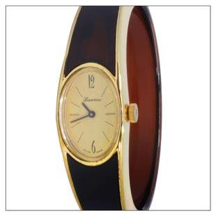 Lucerne: Ladies watch Dial: Champagne Case: Gold capped Size: 32mm Accessories: None Condition Report: Case: Case is in excellent condition Dial: Dial is in excellent condition Movement: The quartz movement