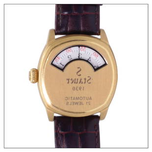 Stauer: Model: 1930 Dashtronic Dial: White Case: Gold finished Size: 38mm Accessories: None Condition Report: Case: Excellent condition case with light signs of wear Dial: Dial is in excellent condition