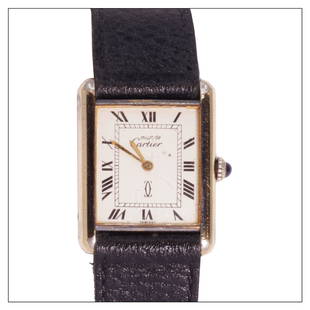 Cartier: Model: Must De Cartier Reference: — Case: 212227 Year: 1980s Case Material: Gold Plated 20 microns Case Diameter: 30 x 24mm Dial: White Roman Movement: Manual Functions: Time only Caliber: 78-1