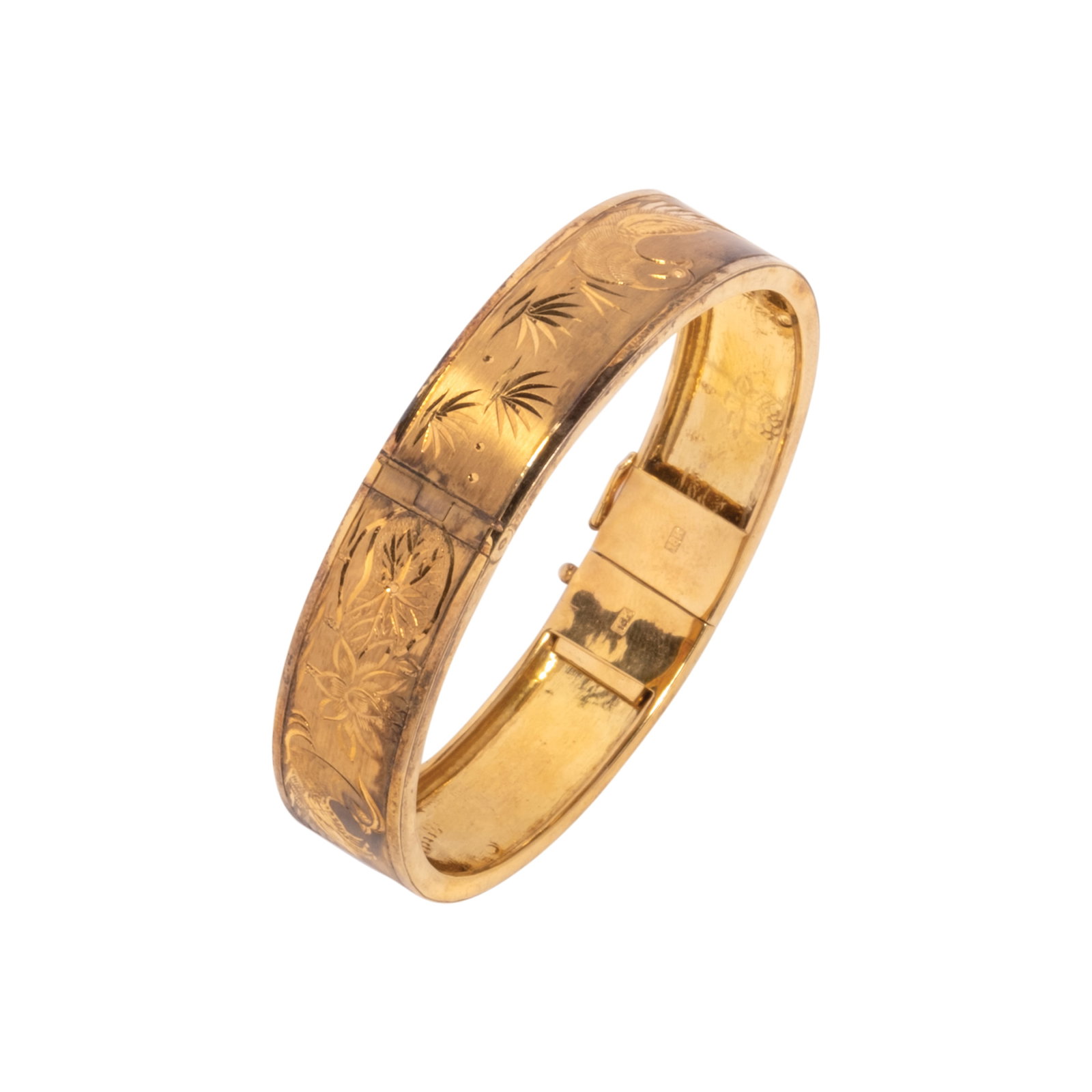 An 8k Oriental Bangle: The 8k yellow gold bangle is engraved with oriental motifs of pheasants, lotus flowers and lotus leaves. In Chinese culture, pheasants and lotus flowers signify symbolic meanings. Pheasants symbolise 