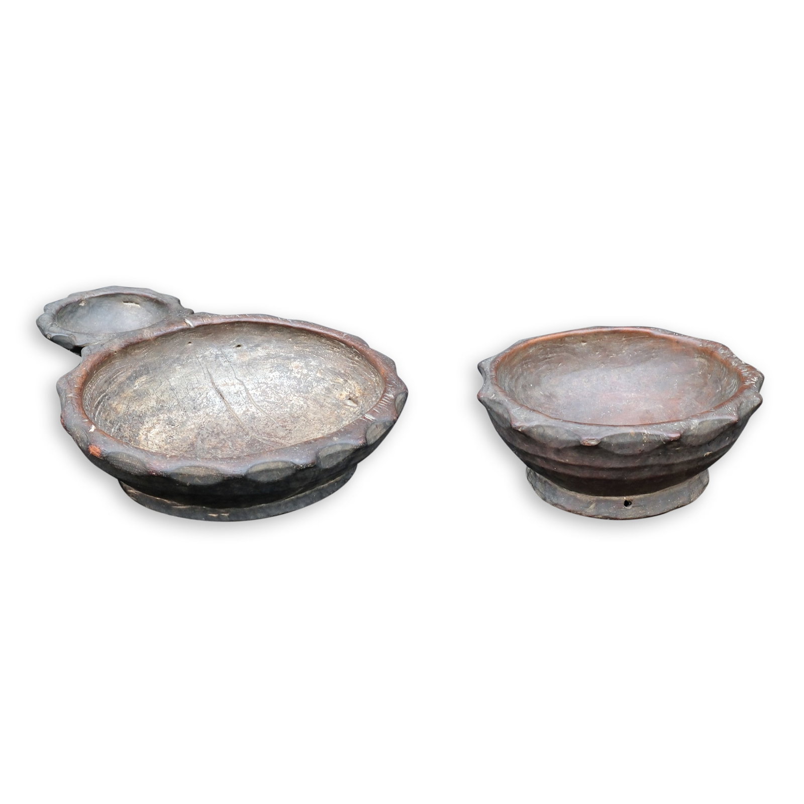 Two Ifugao Ritual Bowls or Duyo: a. 3” x 15” x 12” (8 cm x 38 cm x 30 cm) b. H:4” x D: 9 1/2” (10 cm x 24 cm)